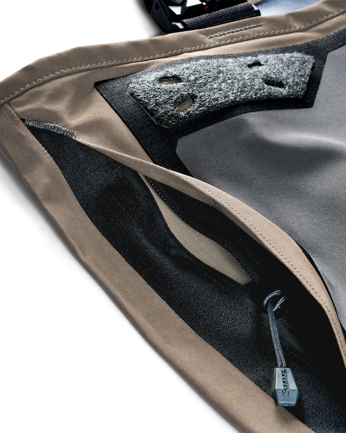 Simms G3Z Pro Stockingfoot Wader - Close-up zipper side pocket and fly patch