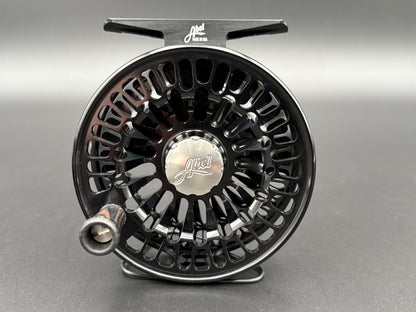 Abel TR Fly Reels in Black with classic click-pawl design - side