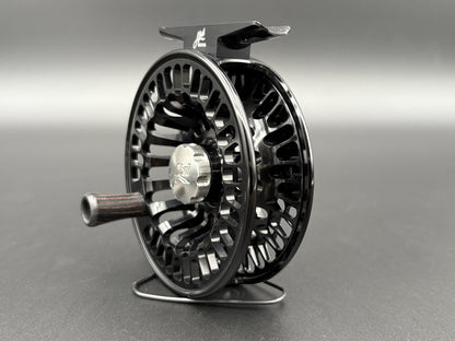 Abel TR Fly Reels in Black with classic click-pawl design - angled