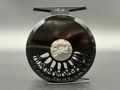 Abel TR fly reel in Black finish with ported spool and palming rim